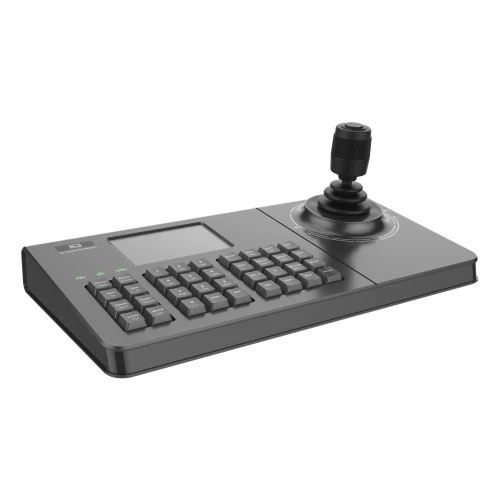Na zdjęciu znajduje się czarna klawiatura sieciowa z joystickiem po prawej stronie i wyświetlaczem po lewej. Klawiatura posiada liczne przyciski, a jej design jest nowoczesny i funkcjonalny.