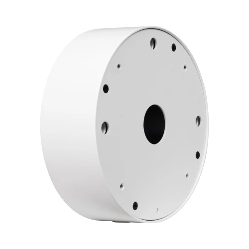 Biała, okrągła puszka montażowa do kamer z kilkoma otworami na śruby. Posiada centralny otwór na przewody, widoczna na białym tle.