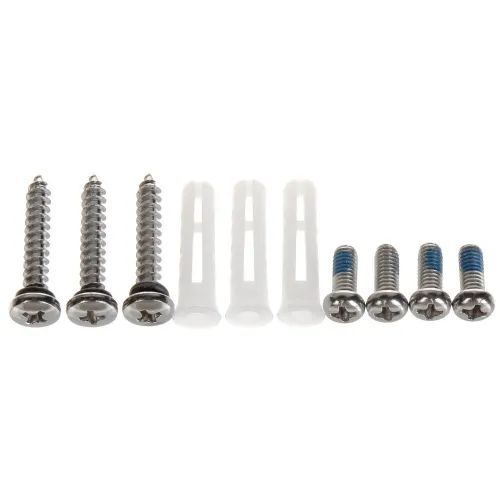 Na zdjęciu znajduje się zestaw montażowy składający się z czterech srebrnych wkrętów, trzech białych kołków rozporowych oraz czterech mniejszych srebrnych śrub z niebieskim zabezpieczeniem gwintu. Elementy są ułożone w jednym rzędzie na białym tle.