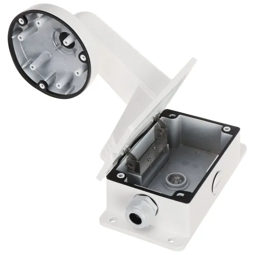 Zdjęcie przedstawia białą obudowę montażową z otwartą pokrywą, ukazującą wnętrze z miejscem na okablowanie. Obudowa posiada kilka otworów montażowych i jest wyposażona w przepust kablowy.