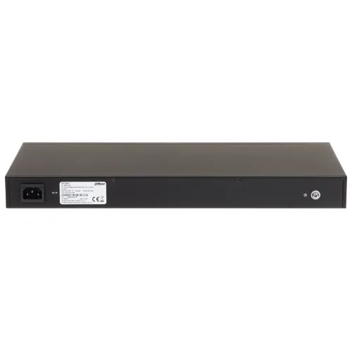 Czarny, prostokątny sprzęt elektroniczny widziany od tyłu z widocznym gniazdem zasilania po lewej stronie. Na środku znajduje się etykieta z informacjami technicznymi, a po prawej stronie jest mały przycisk.