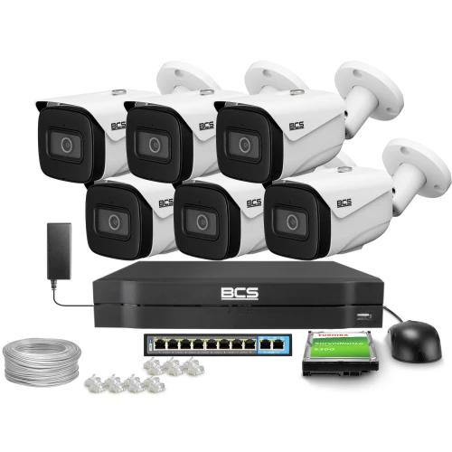 Zestaw do monitoringu składający się z sześciu białych kamer BCS, rejestratora, dysku twardego, kabla, wtyków oraz switcha. Kamery są ustawione w dwóch rzędach, a pozostałe elementy są rozmieszczone poniżej.