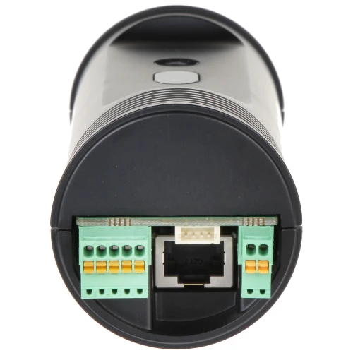 Cylindryczne urządzenie z widocznymi złączami, w tym portem Ethernet i zielonymi terminalami śrubowymi. Obudowa jest czarna z gładkim wykończeniem.